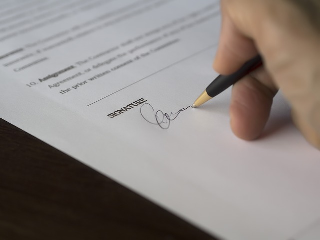 Homebuyer Signing a Real Estate Contract